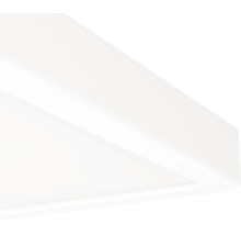 Vue détaillée de l'angle d'un plafonnier blanc ou d'un panneau LED.