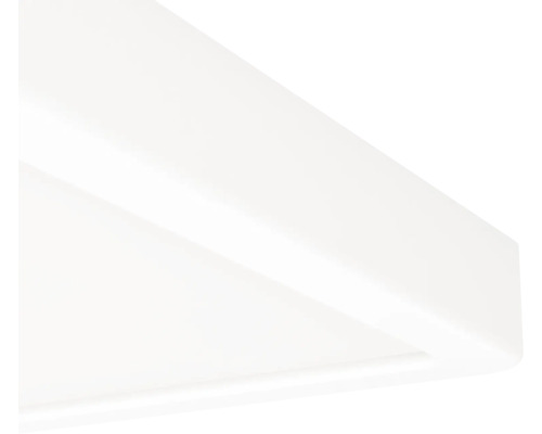 Vue détaillée de l'angle d'un plafonnier blanc ou d'un panneau LED.