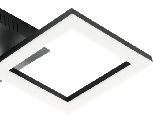 Détail d'un plafonnier LED moderne de forme carrée avec cadre noir et diffuseur blanc.