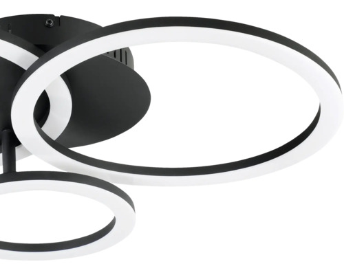 Plafonnier LED moderne noir et blanc avec anneaux superposés en métal et plastique.