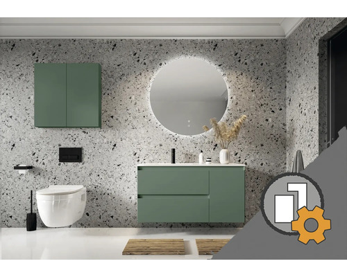 Modernes Badezimmer mit grünem Waschtischunterschrank, rundem LED-Spiegel und Wandschrank vor Wänden in Terrazzo-Optik, inklusive Wand-WC.