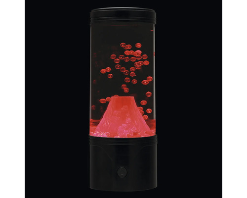Lampe lave volcan avec billes ascendantes dans un boîtier cylindrique en plastique avec socle.