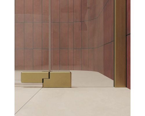 Vue détaillée d une charnière de cabine de douche en métal devant une paroi de douche carrelée.