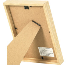 Vue arrière d'un cadre photo en bois avec support et clips métalliques pour la fixation.