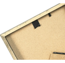 Dos d un cadre photo en bois avec dispositif de suspension et support