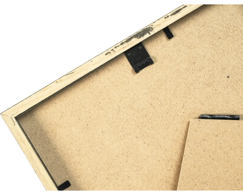 Dos d un cadre photo en bois avec dispositif de suspension et support
