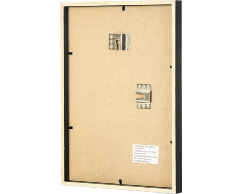 Dos d'un cadre photo en bois avec deux attaches métalliques pour format portrait et paysage.