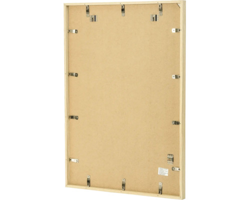 Dos d un cadre photo en bois avec clips métalliques et crochets pour montage mural