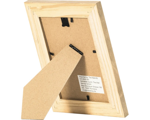 Dos d'un cadre photo en bois avec support et clips métalliques pour la fixation