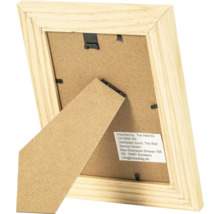 Vue arrière d un cadre photo en bois avec support et clips métalliques