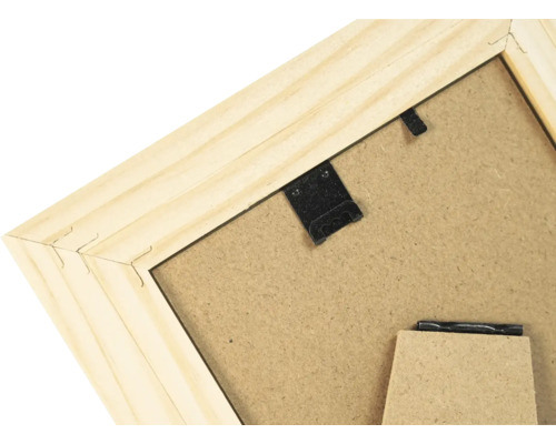 Vue arrière d un cadre photo en bois avec crochet de suspension et support
