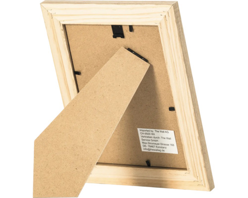 Vue arrière d un cadre photo en bois avec support et clips en métal
