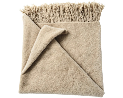 Weiche Wohndecke mit Fransen in beige.
