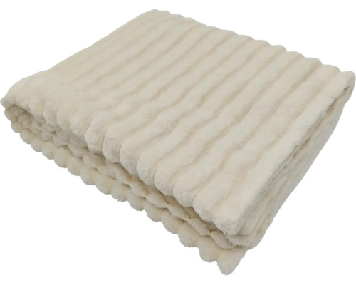 Eine weiche Wohndecke mit gestreifter Struktur, gefaltet als dekorative Heimtextilie.