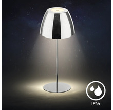 Lampe de table avec abat-jour brillant et indice de protection IP44 pour usage extérieur.