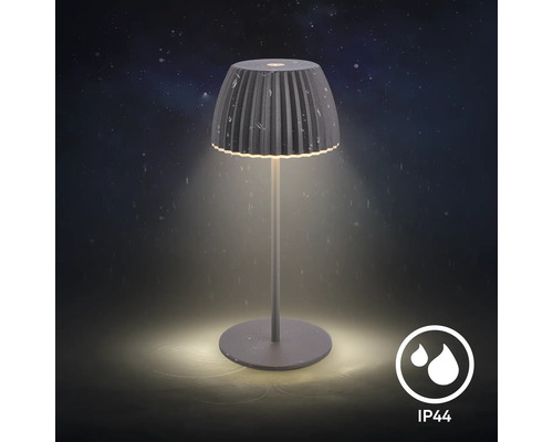 Moderne LED Tischleuchte fuer den Aussenbereich mit Schirm und Schutzart IP44 fuer Spritzwasserschutz