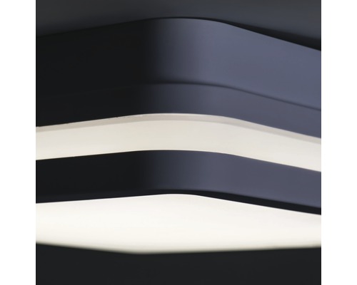 Gros plan d''un plafonnier moderne au design incurvé