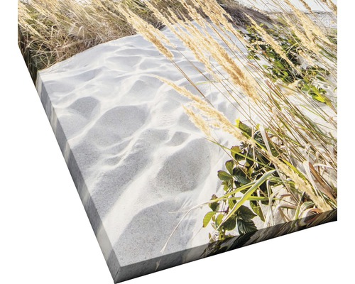 Gros plan d''une toile avec un motif de dunes avec du sable et de l''oyat