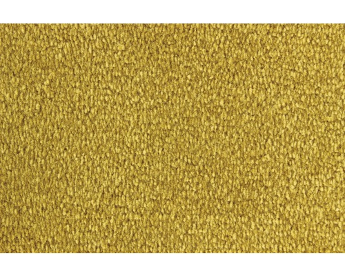 Nahaufnahme eines gelben Teppichs.