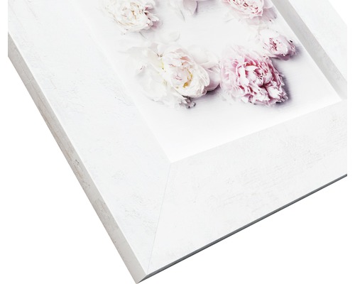 Cadre photo blanc avec motif floral