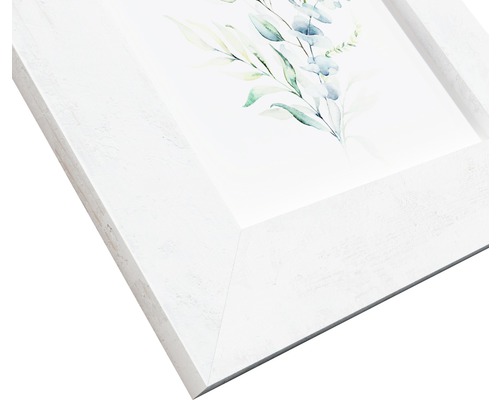 Cadre photo blanc avec motif floral
