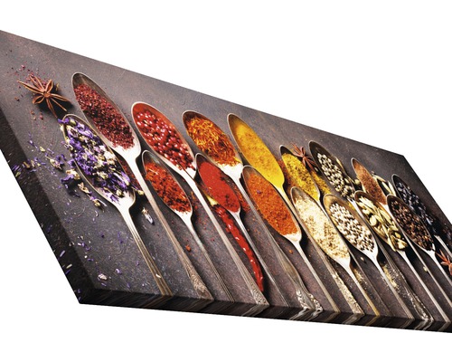 Dekorative Leinwand mit Gewürzen in Löffeln