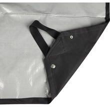 Vue détaillée d''une bâche de protection avec des œillets et une boucle de transport