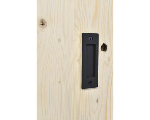 Schwarze Schiebetür-Griffmuschel an einer Holztür