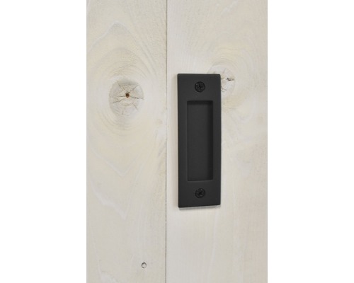 Schiebetürgriff aus Metall an einer Holztür