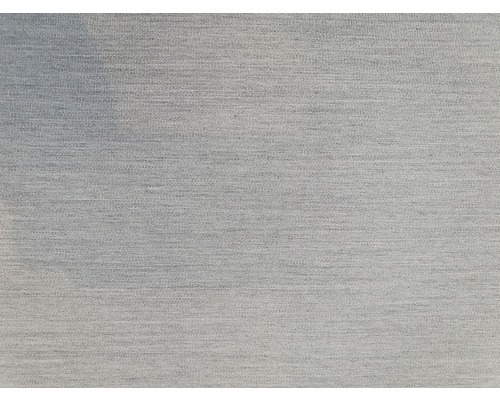 Gros plan d''un tissu clair à texture fine.