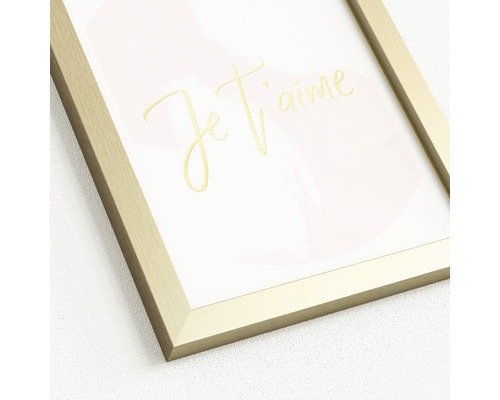 Dekoratives Bild mit goldenem Rahmen und der Aufschrift ''Je t''aime''