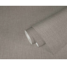 Un rouleau de papier peint à l'aspect textile.