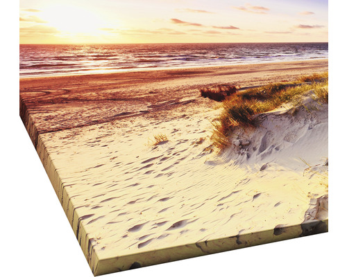 Impression sur toile représentant une scène de plage au coucher du soleil