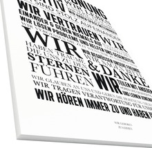 Dekoratives Wandbild mit typografischem Design und positivem Text auf Deutsch