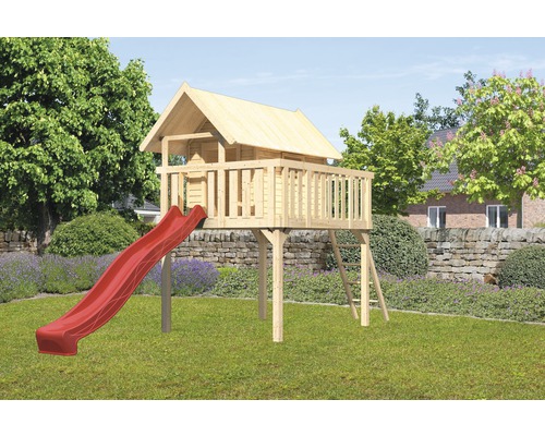 Tour de jeu avec toboggan et échelle dans le jardin