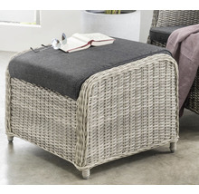 Rattan Hocker mit Sitzkissen und Buch