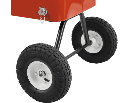 Vue détaillée d''un épandeur d''engrais avec pneus et éléments métalliques