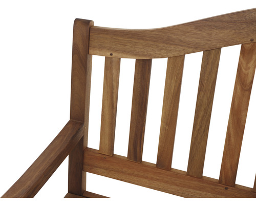 Gros plan d''un banc en bois avec accoudoir et barreaux verticaux dans le dossier