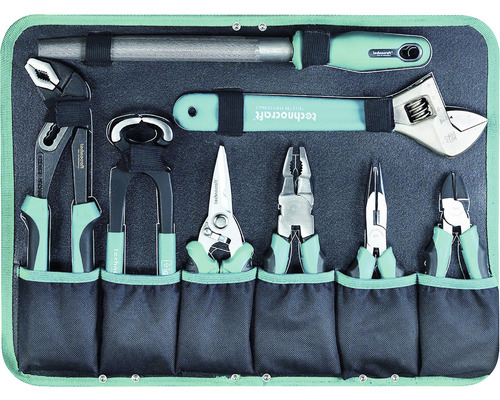 Werkzeugsatz mit verschiedenen Zangen, Schraubenschlüssel und Feile in einer Werkzeugtasche.