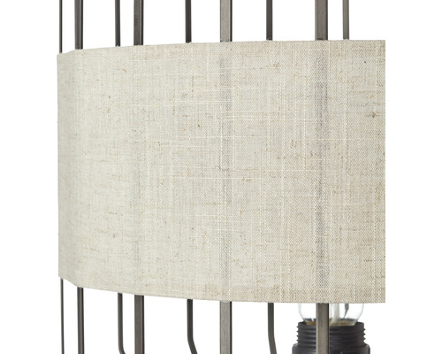 Vue détaillée d''une lampe de table avec abat-jour en tissu et structure en métal