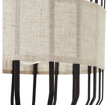Detailansicht einer Lampe mit Textilschirm und Metallgestell