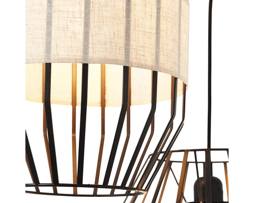 Vue détaillée d''une suspension avec abat-jour en tissu et structure métallique