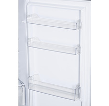 Intérieur d''un réfrigérateur avec trois compartiments de rangement transparents sur la porte