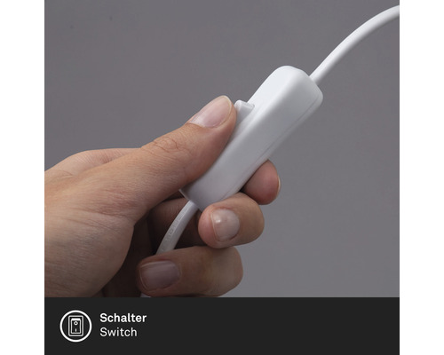 Main actionnant l''interrupteur d''éclairage