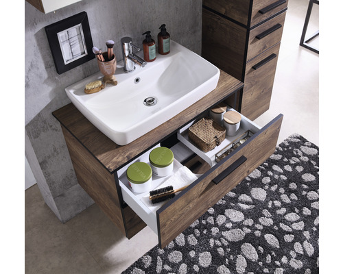 Badezimmer Waschtisch mit Schublade in Holzoptik und weissem Aufsatzwaschbecken.