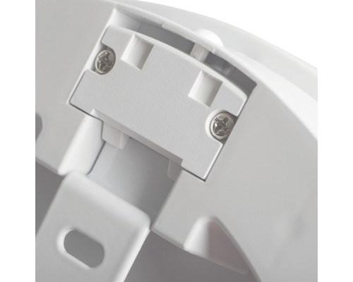 Detailaufnahme einer weißen Lampenhalterung mit Schrauben