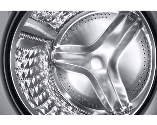 Innenansicht einer Waschmaschinentrommel aus Edelstahl