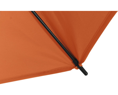 Gros plan d''un parasol avec revêtement en tissu et baleines