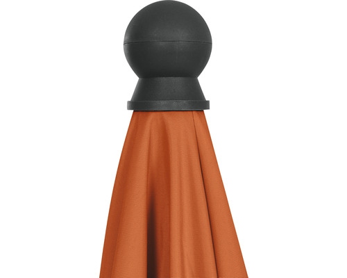 Vue détaillée d''un parasol avec un embout sphérique