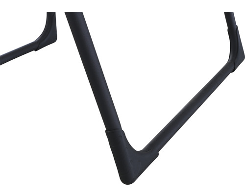 Detailansicht der Beinbasis eines schwarzen Möbels.